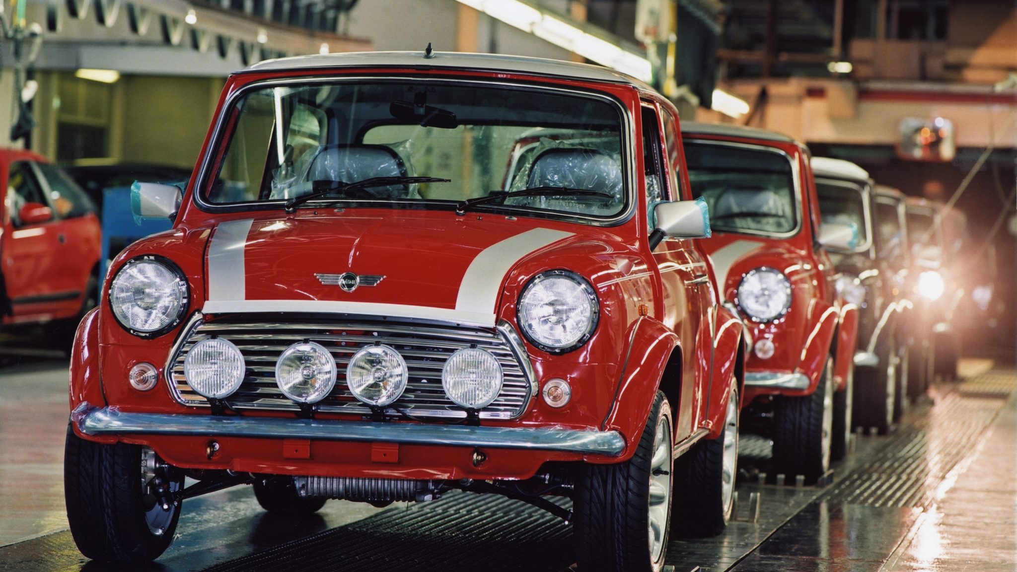 Red Mini Cooper 'Classics' on the production line.