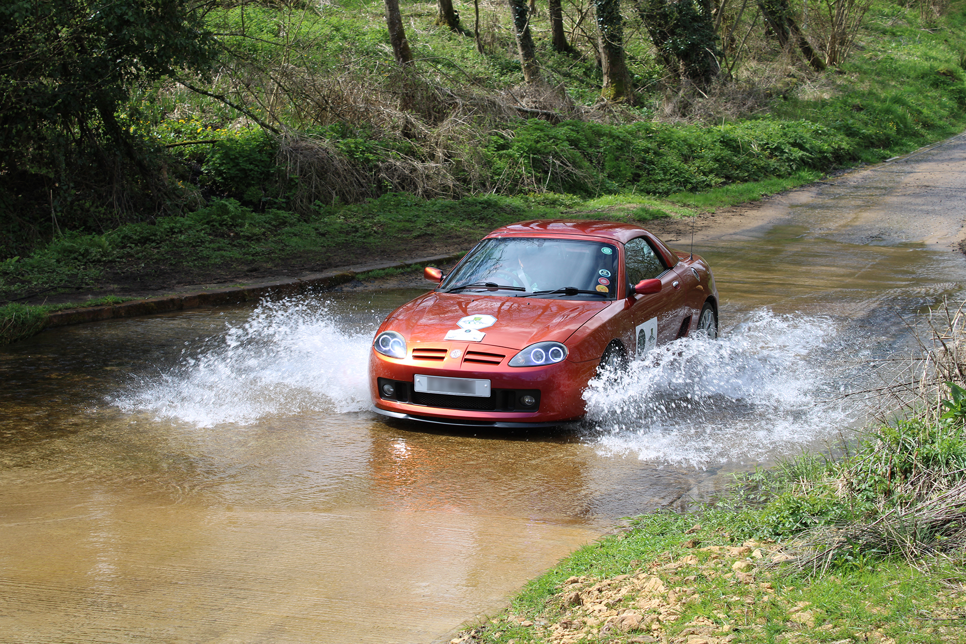 MG car fording water